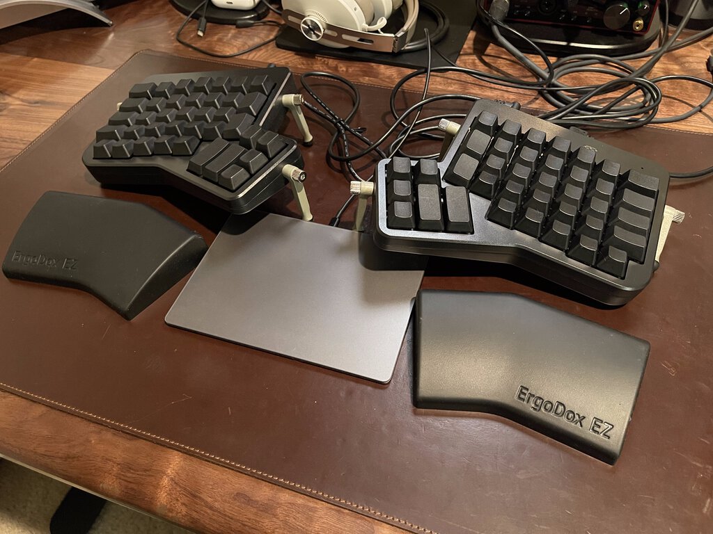 ErgoDox EZ with tent kit, blank caps over Cherry MX Brown tactile switches, and Wing wrist rest